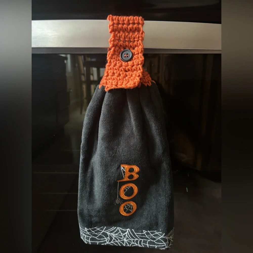Hand crocheted Halloween black towel with “Boo” embroidery